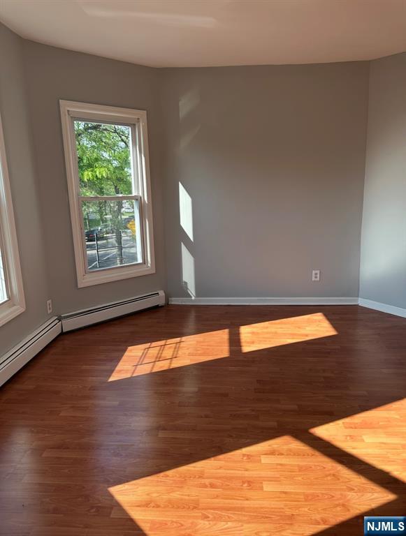 157 3rd Street, Unit 155 Newark, NJ 07107 - Photo 10 of 12 a view of an empty room and window