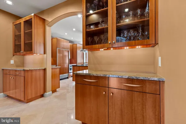 a view of a kitchen with refrigerator and washer