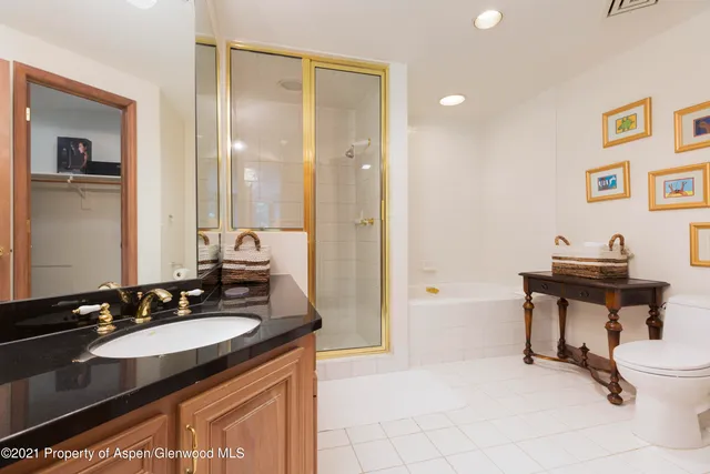 a bathroom with a sink double vanity and a mirror