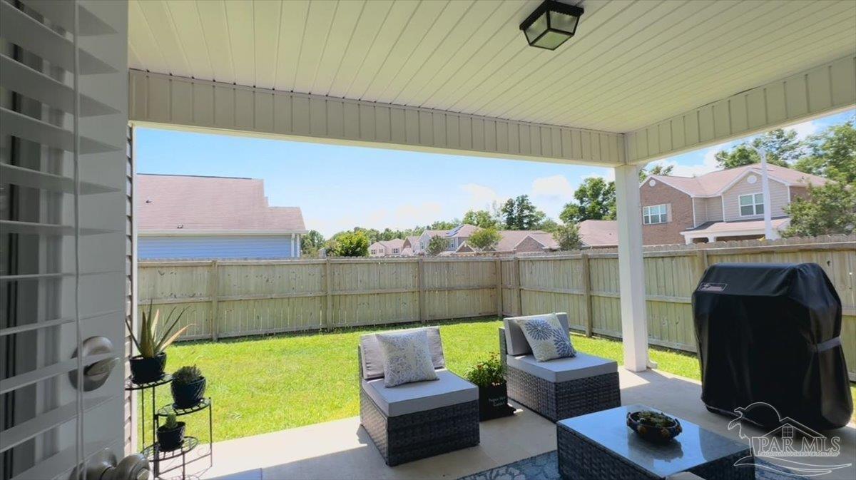 3473 Quail Drive Pace, FL 32571 - Photo 19 of 38 a building outdoor space with patio furniture