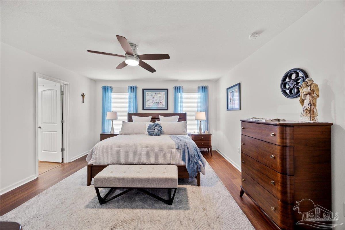 3473 Quail Drive Pace, FL 32571 - Photo 20 of 38 a bed room with a bed and a dresser