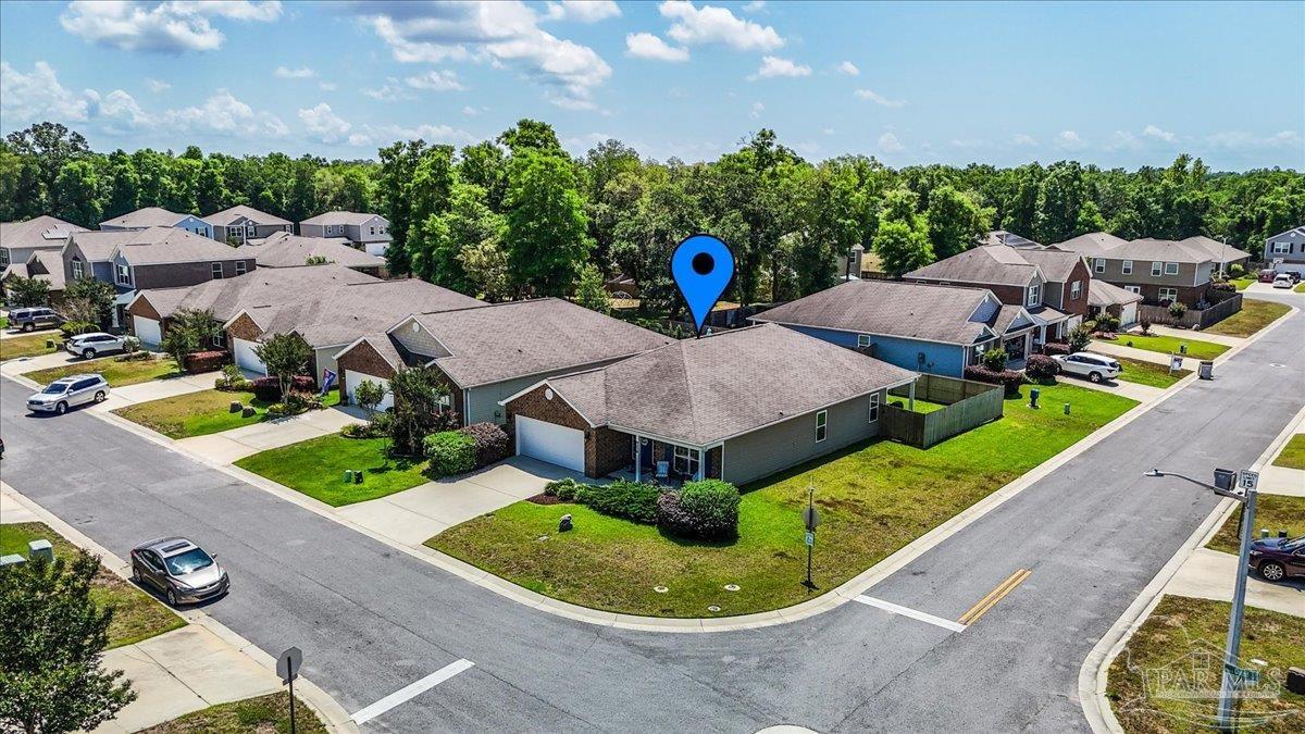 3473 Quail Drive Pace, FL 32571 - Photo 32 of 38 an aerial view of a house with garden space and street view