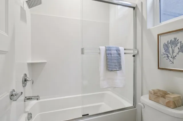 a workspace with furniture and a potted plant