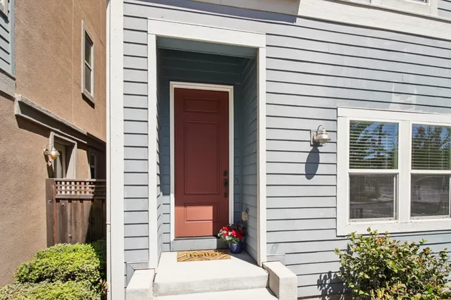a view of a door and a window