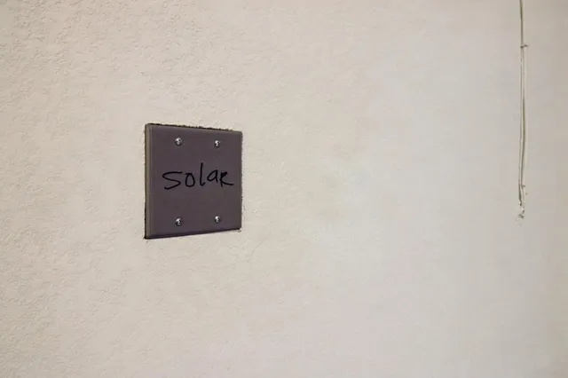 a view of a house with a swimming pool