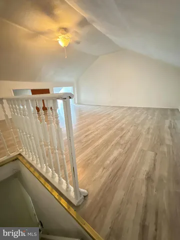 a view of an empty room with a large window