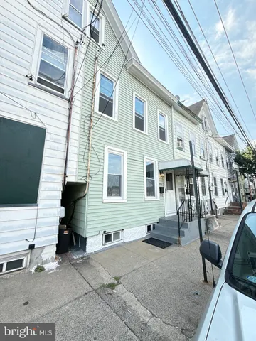a view of a house with a patio