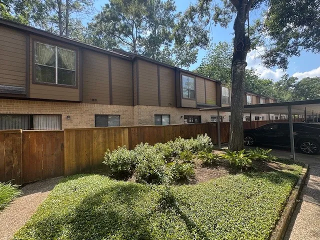a car parked in front of a building