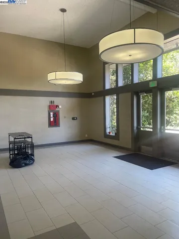 a kitchen with furniture and window