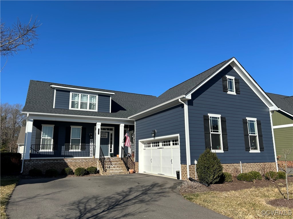 113 Evington Lane Ashland, VA 23005 - Photo 1 of 45 a front view of a house with a yard