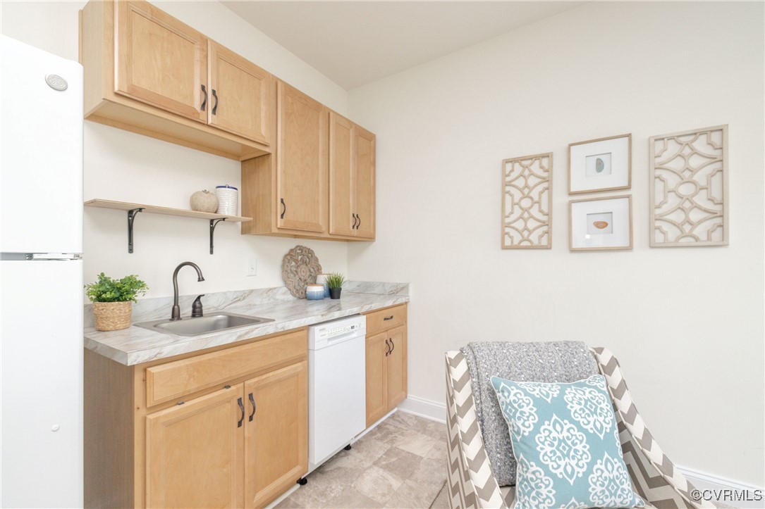 113 Evington Lane Ashland, VA 23005 - Photo 19 of 45 a kitchen with stainless steel appliances granite countertop a sink stove and cabinets