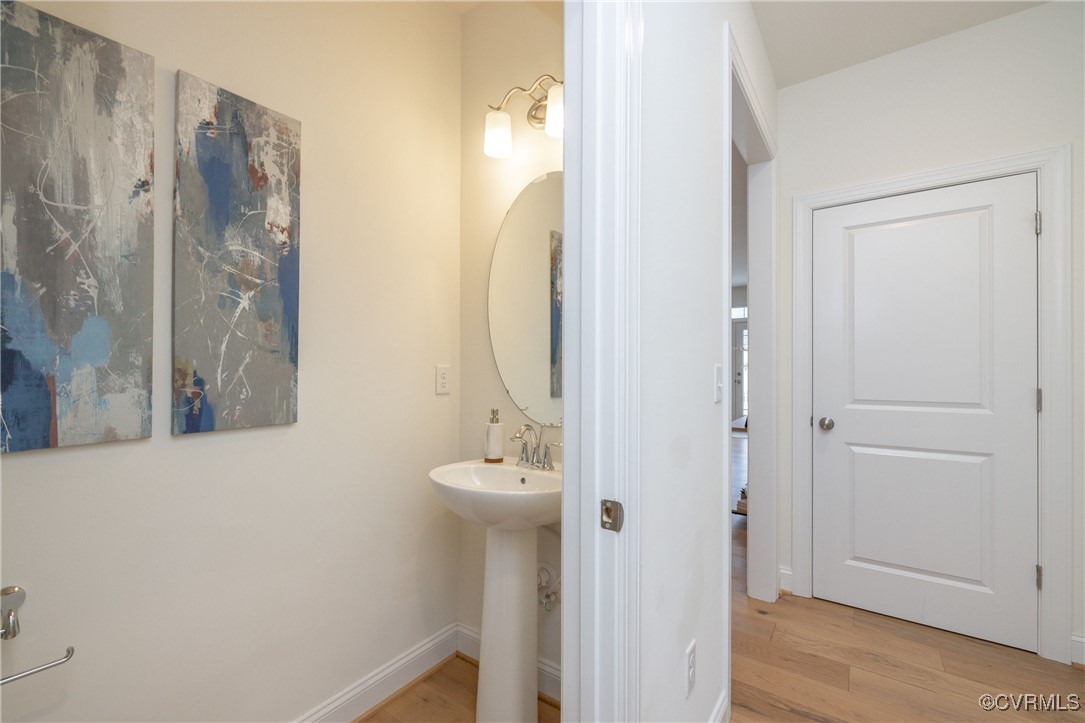 113 Evington Lane Ashland, VA 23005 - Photo 30 of 45 a bathroom with a sink and a mirror
