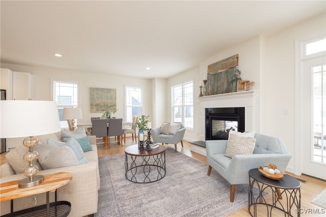 113 Evington Lane Ashland, VA 23005 - Photo 7 of 45 a living room with furniture and a fireplace