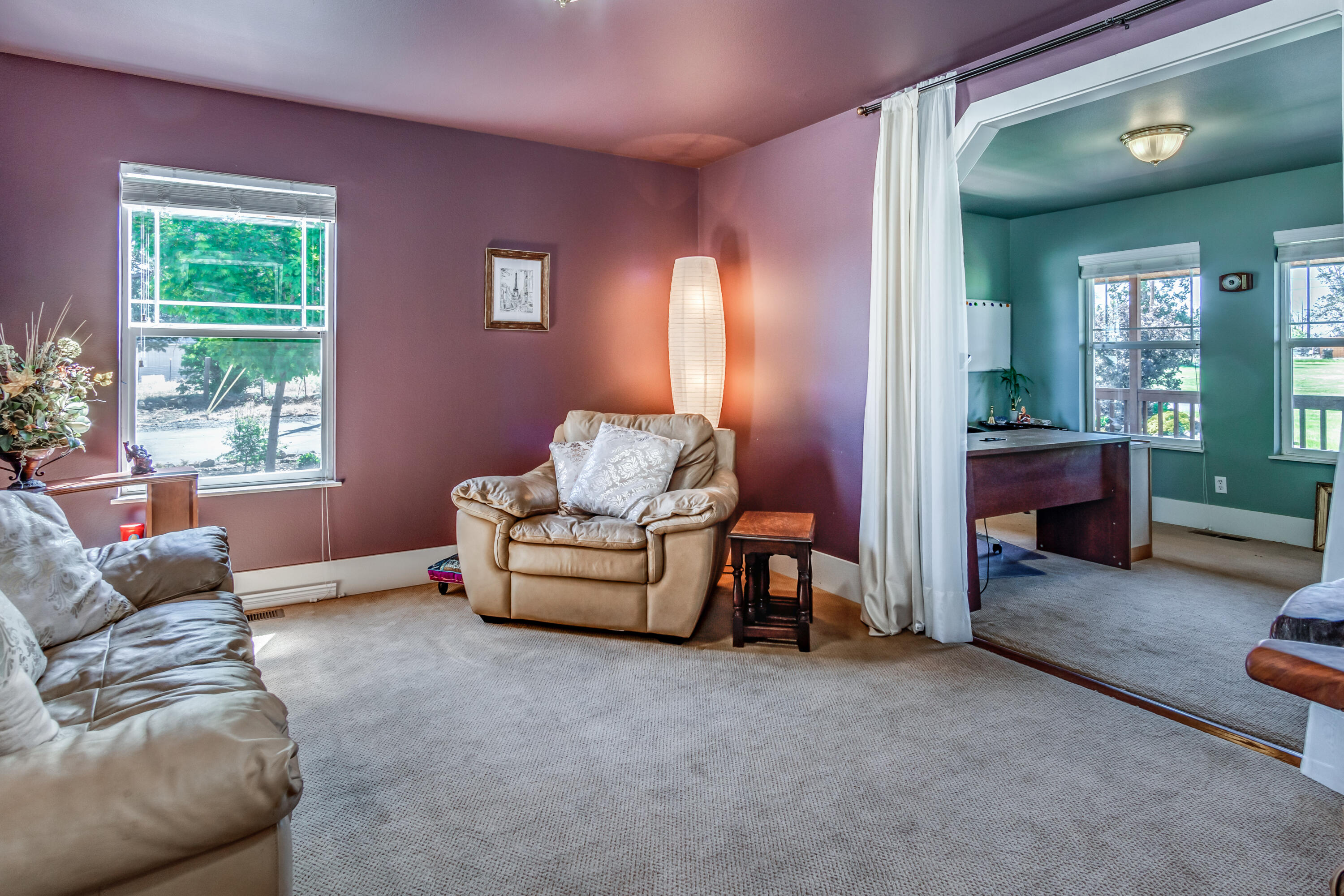 22234 Nelson Road Bend, OR 97701 - Photo 24 of 60 a living room with furniture and a window
