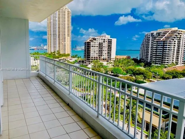 a view of balcony with wooden floor