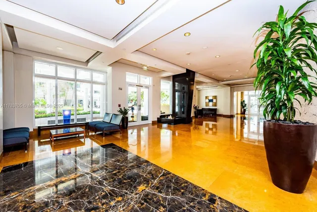 a swimming pool with outdoor seating and yard