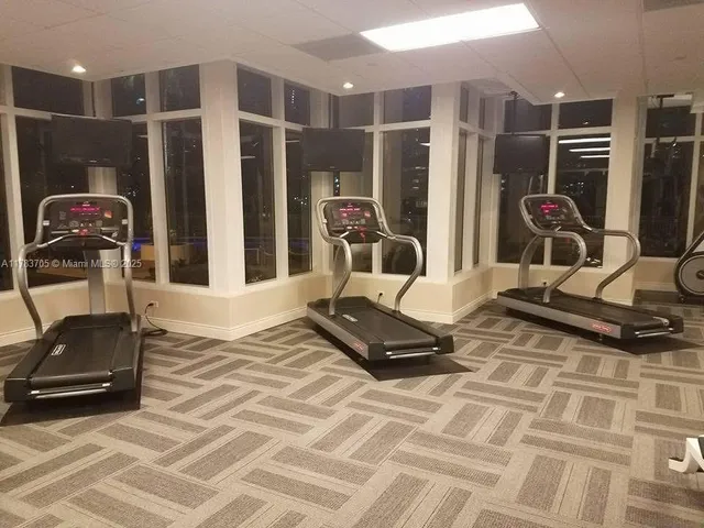 a view of a room with gym equipment