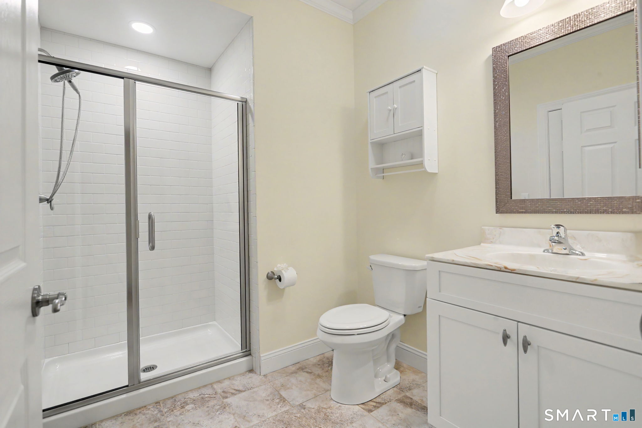 223 Meadow Brook Road, Unit 223 Oxford, CT 06478 - Photo 22 of 34 a bathroom with a granite countertop sink toilet and shower