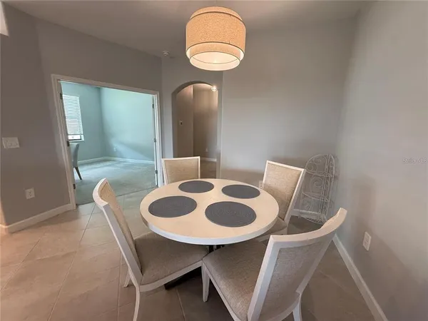a room with furniture and a flat screen tv