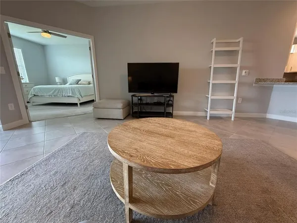 a kitchen with stainless steel appliances granite countertop refrigerator sink and cabinets