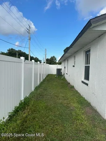 a view of a backyard with plants