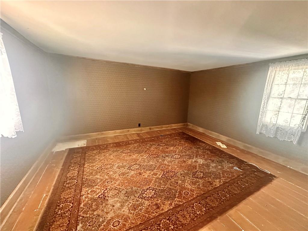 152 Concord Street Perryopolis, PA 15473 - Photo 11 of 18 wooden floor in an empty room with a window