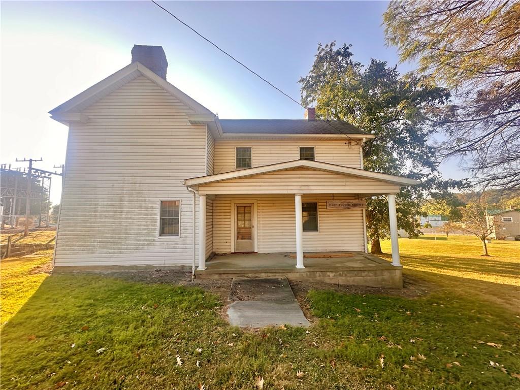 152 Concord Street Perryopolis, PA 15473 - Photo 8 of 18 a front view of a house with a yard