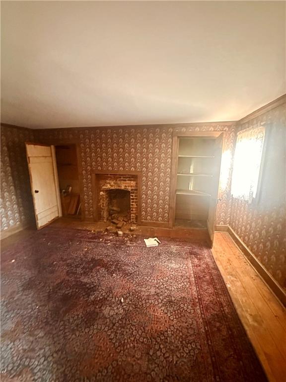 152 Concord Street Perryopolis, PA 15473 - Photo 10 of 18 a view of a hallway with brick walls