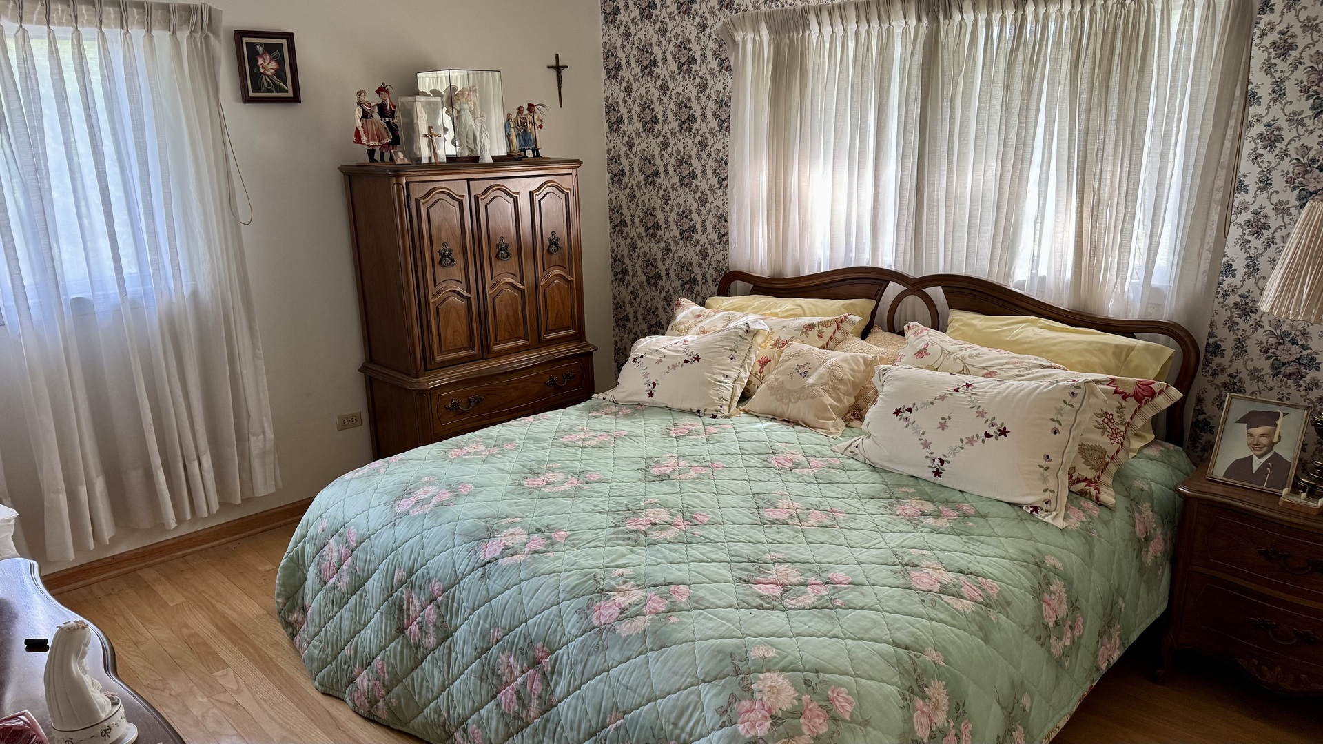 900 East Golfview Drive Mount Prospect, IL 60056 - Photo 9 of 11 a bedroom with a bed next to a window