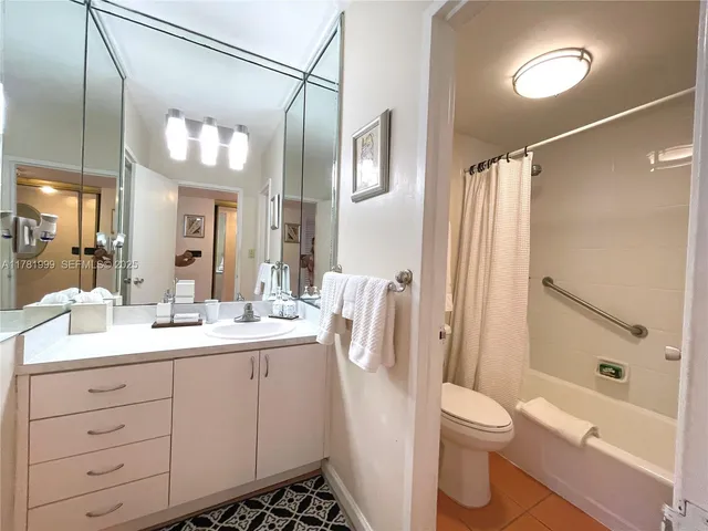 a view of a balcony with chair and table