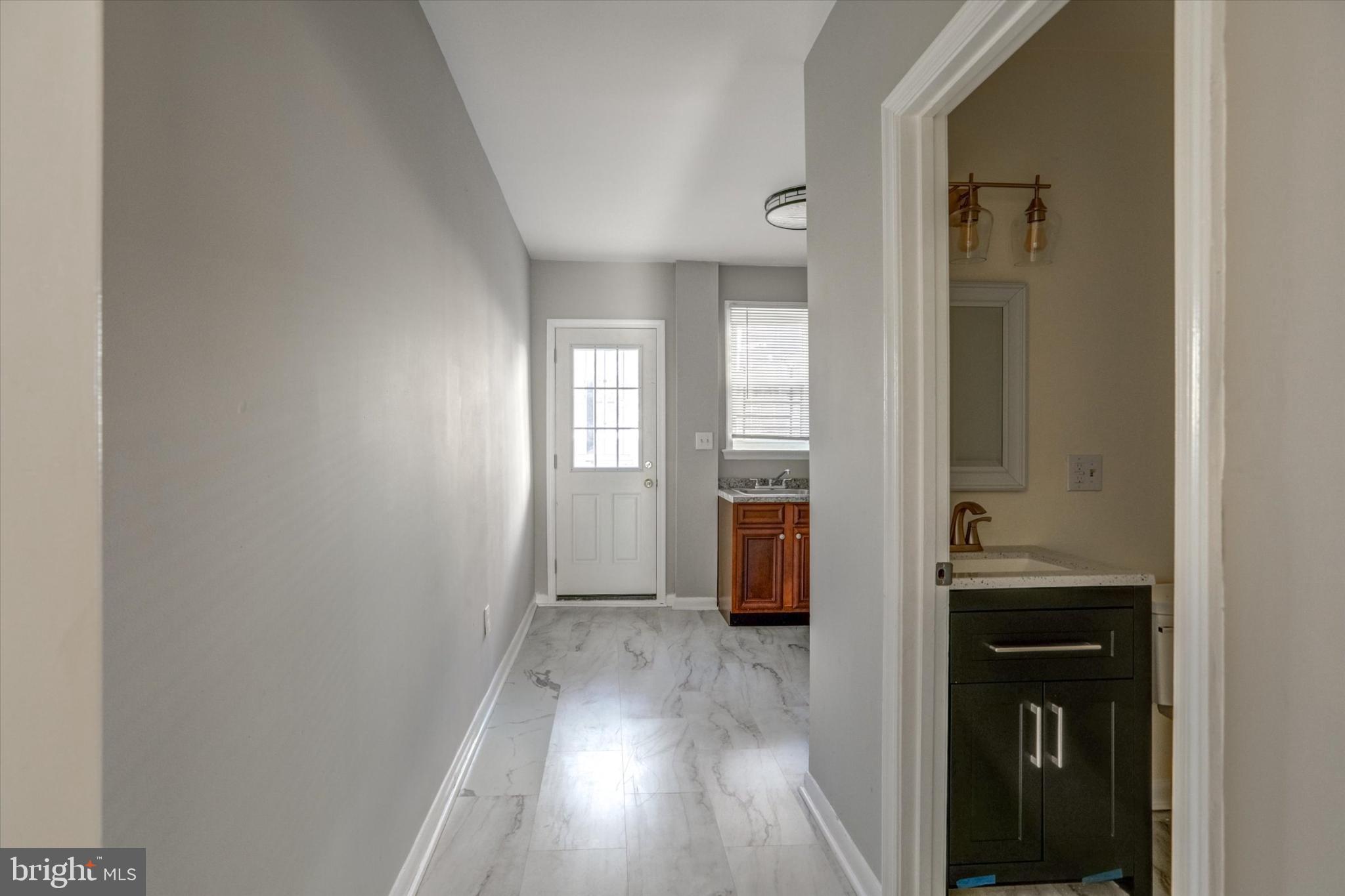 1210 Whitelock Street Baltimore, MD 21217 - Photo 14 of 51 Bright and inviting entryway with modern flair.