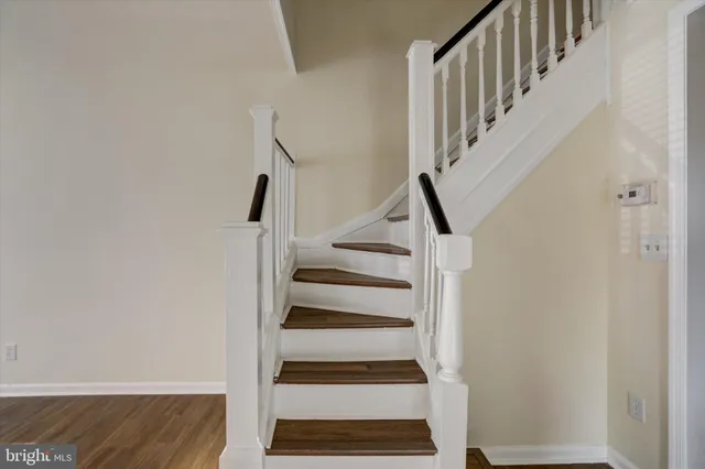 a view of entryway with wooden floor