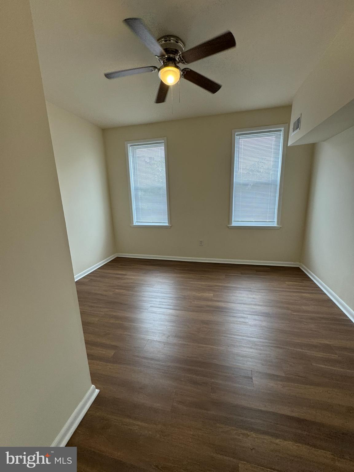 1210 Whitelock Street Baltimore, MD 21217 - Photo 17 of 33 a view of room with wooden floor and windows