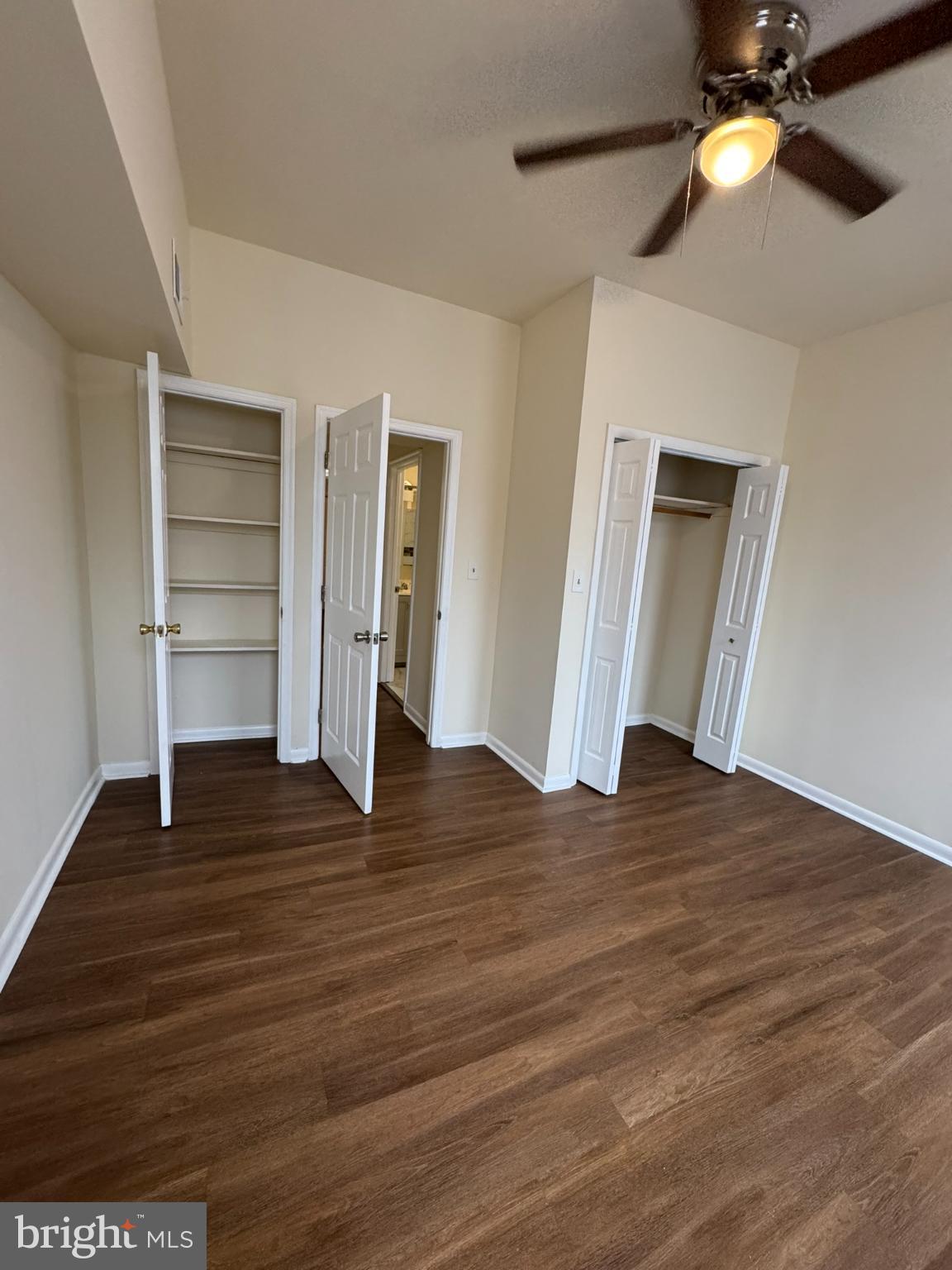 1210 Whitelock Street Baltimore, MD 21217 - Photo 20 of 33 a view of empty room with wooden floor