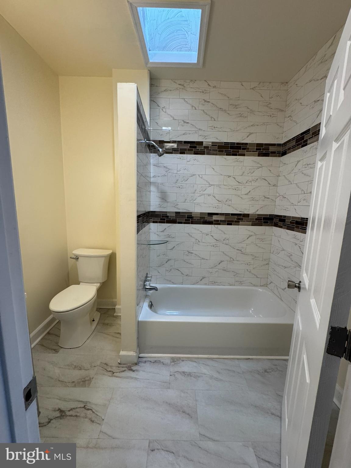 1210 Whitelock Street Baltimore, MD 21217 - Photo 21 of 33 a bathroom with a toilet and a shower