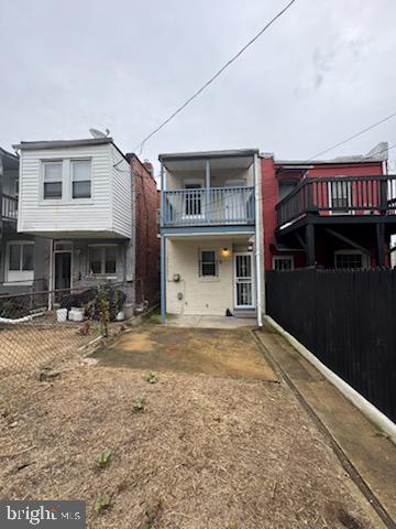 1210 Whitelock Street Baltimore, MD 21217 - Photo 32 of 33 a view of a house with a patio