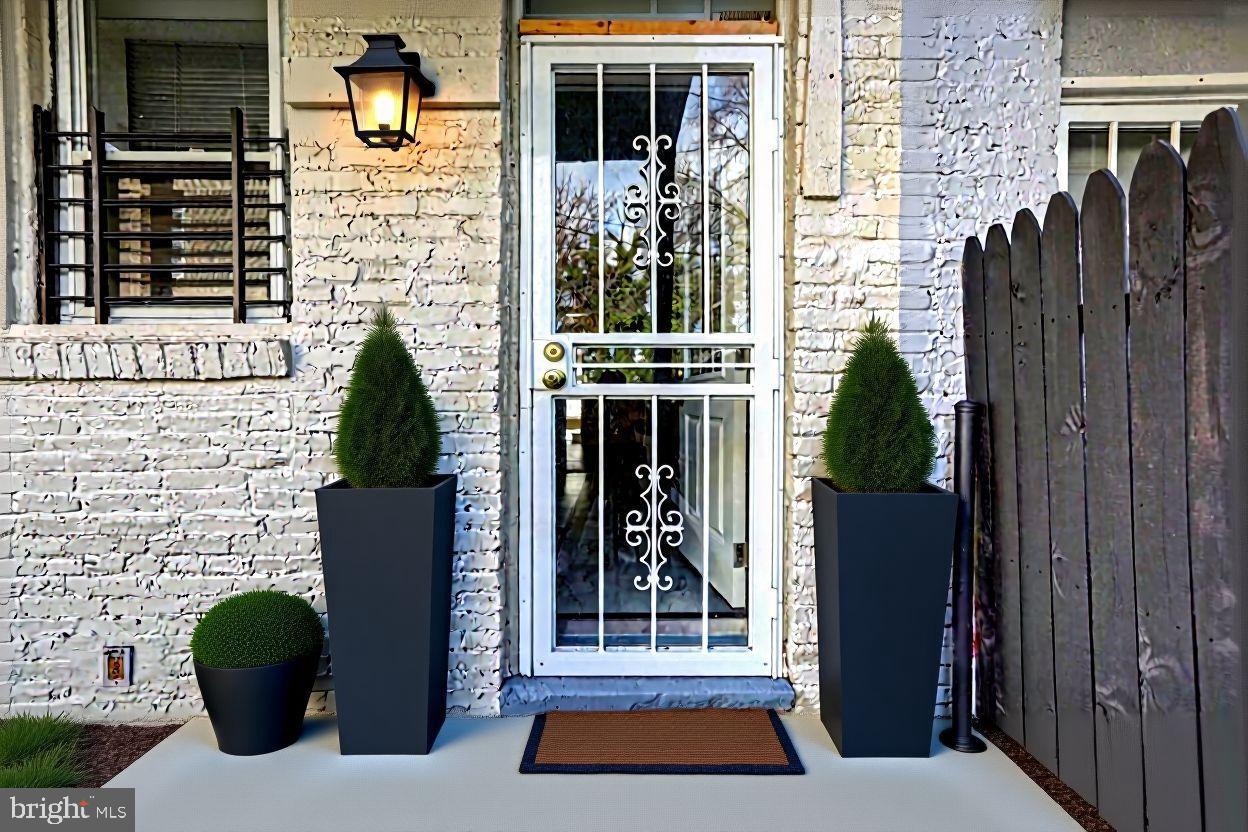 1210 Whitelock Street Baltimore, MD 21217 - Photo 51 of 51 Charming entrance with elegant greenery.