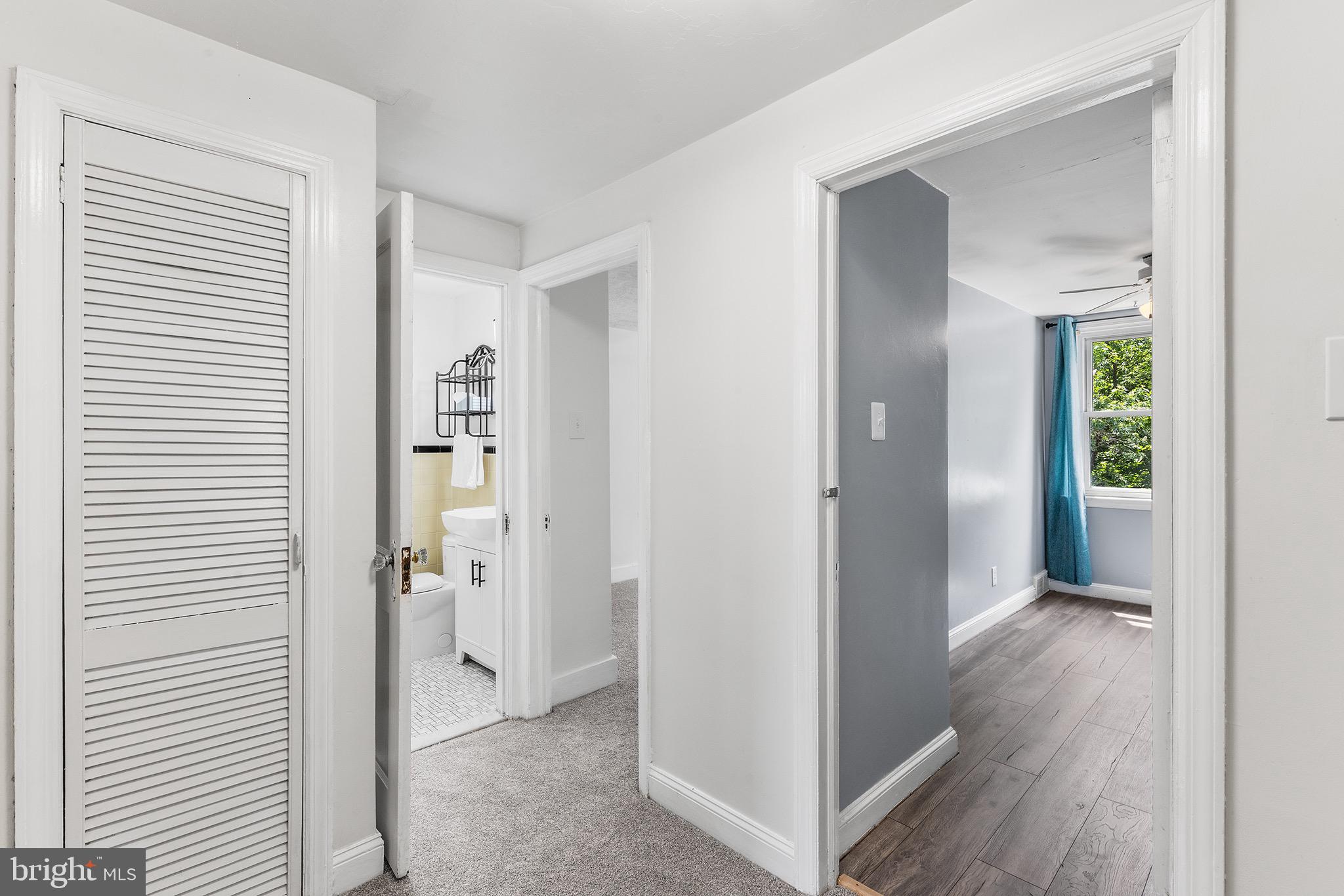 390 Glen Cove Road Collingdale, PA 19023 - Photo 19 of 27 a view of a hallway with closet and a livingroom view