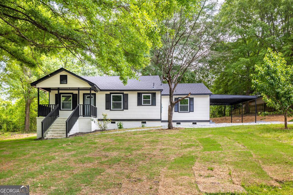 344 Lee Road Salem, AL 36874 - Photo 1 of 1 a front view of a house with a yard