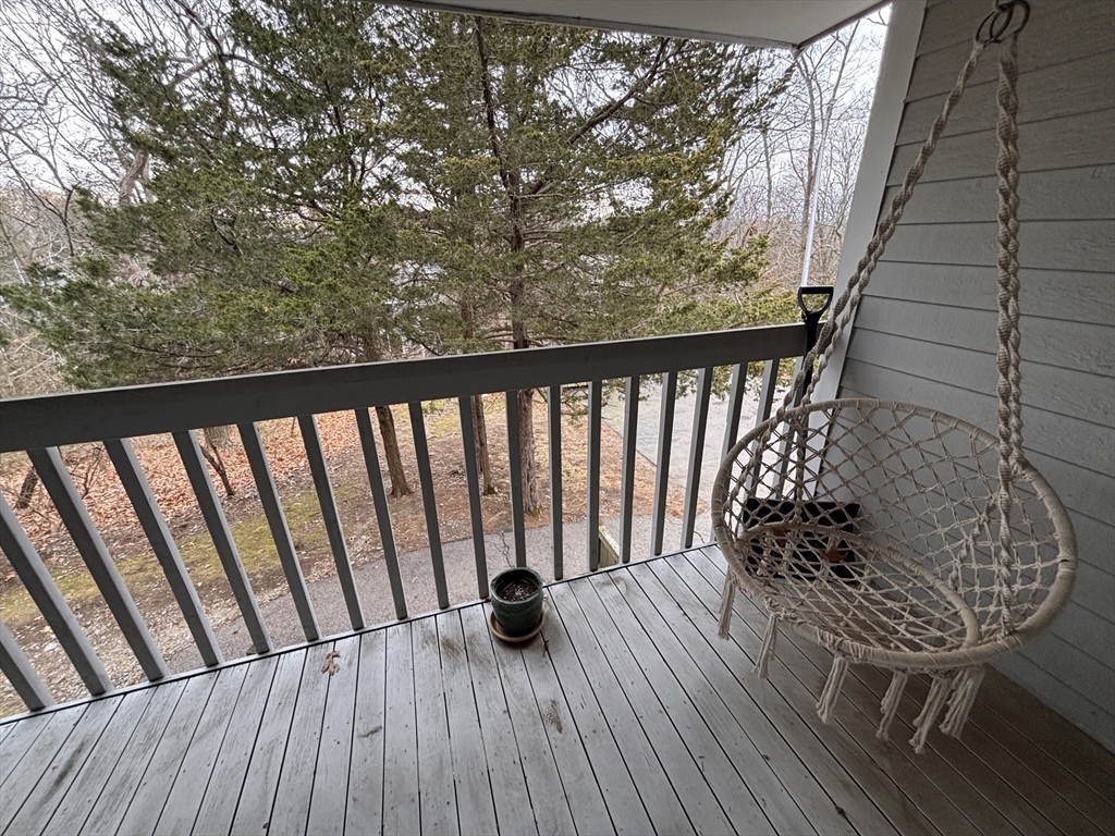 8 Beal's Cove Road, Unit K Hingham, MA 02043 - Photo 8 of 10 a view of balcony with wooden floor