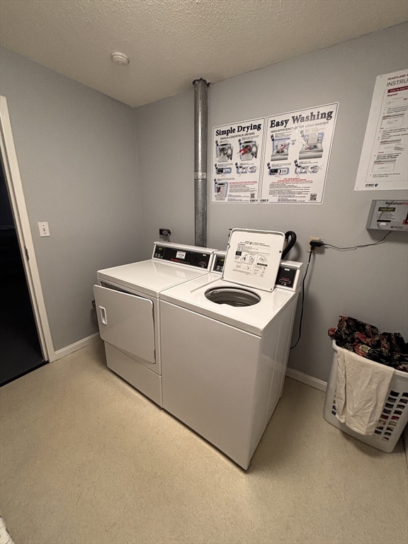 8 Beal's Cove Road, Unit K Hingham, MA 02043 - Photo 10 of 10 a utility room with dryer and washer