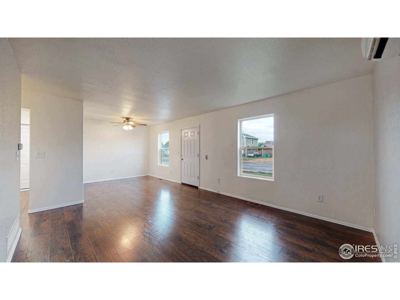 3725 Riverside Parkway Evans, CO 80620 - Photo 8 of 35 Living Room/Dining Room