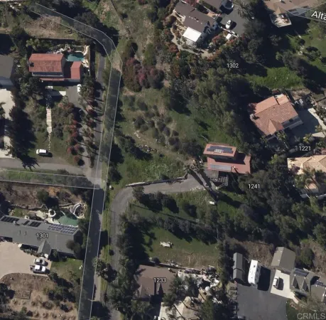 an aerial view of multi story residential apartment building with outdoor space