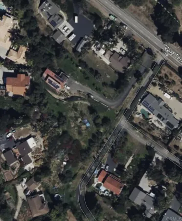 a view of a garden with a pathway