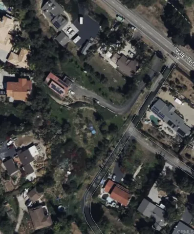 a view of a garden with a pathway