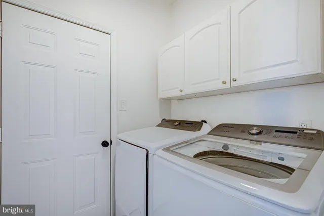 a workspace with furniture and wooden floor