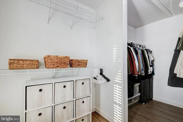a balcony view with a sink and mirror