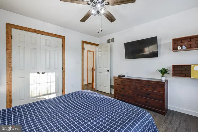 an aerial view of a house with a swimming pool