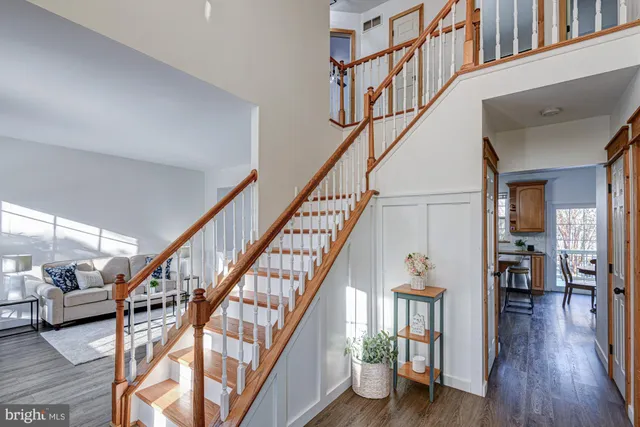 a living room with furniture and windows