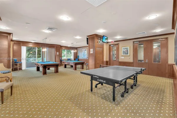 a view of a swimming pool with a garden